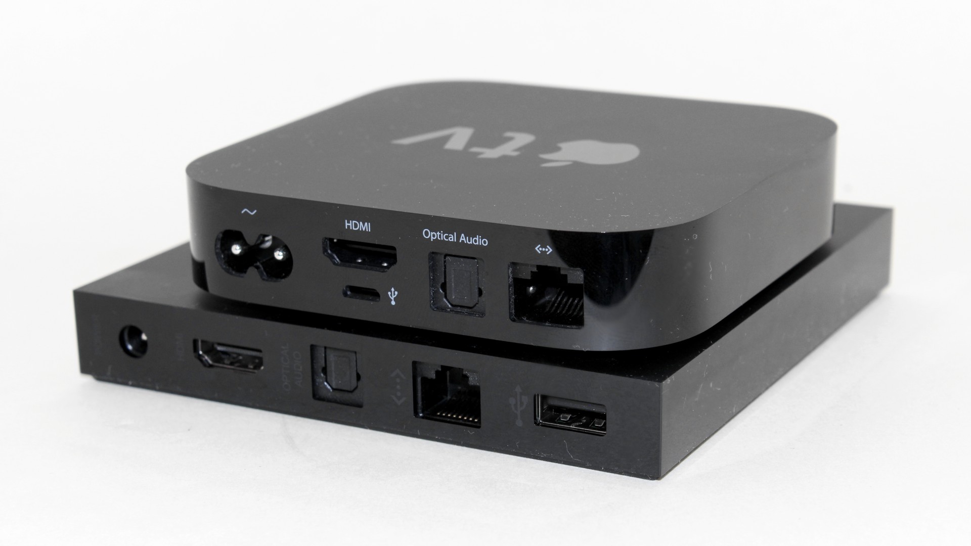 Amazon Fire TV and Apple TV stacked rear view