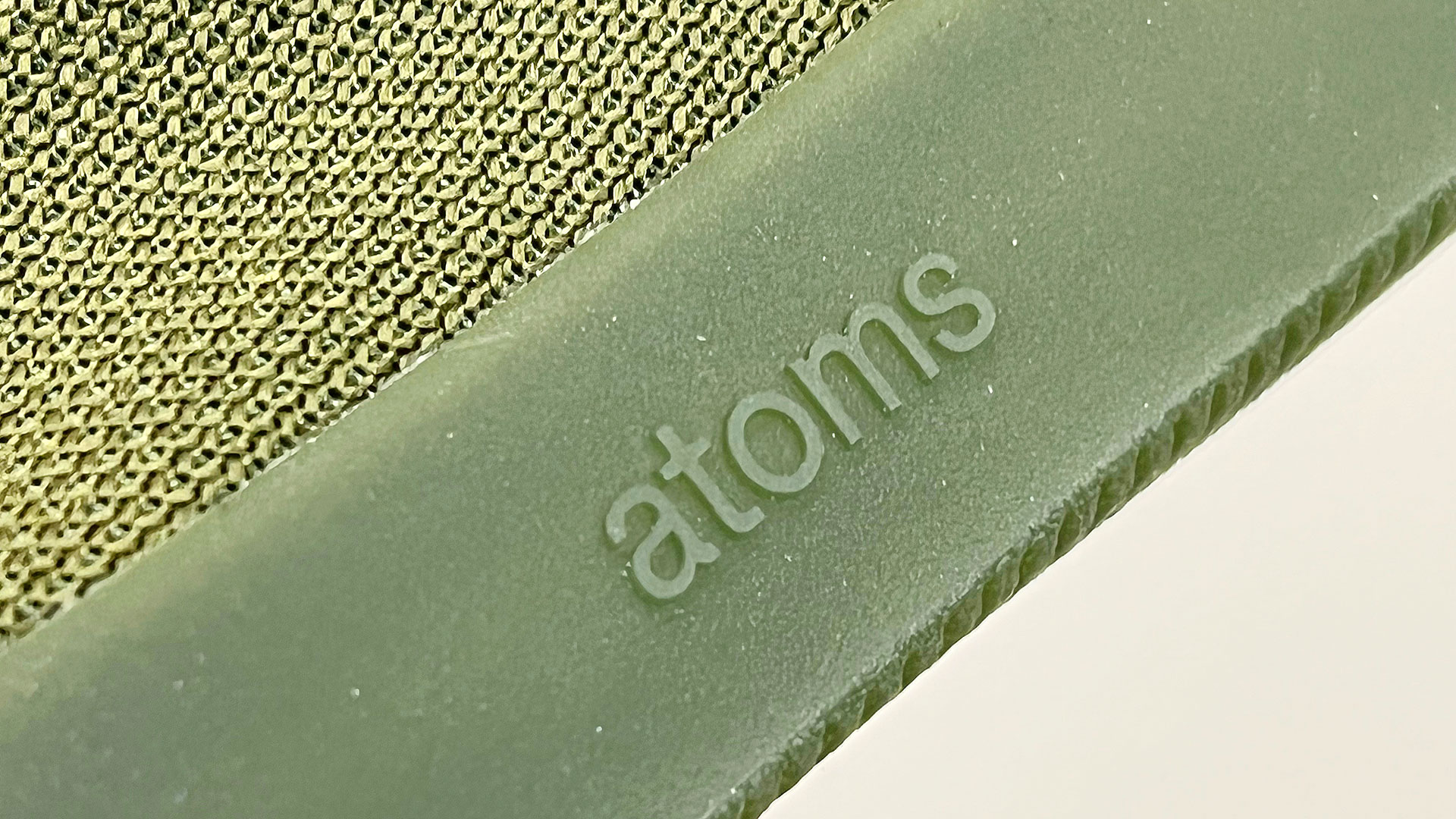 Atoms 001 Clove Green outsole logo